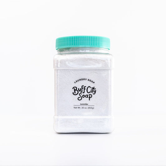 container of Buff City Soap's lavender scented laundry soap with a teal lid